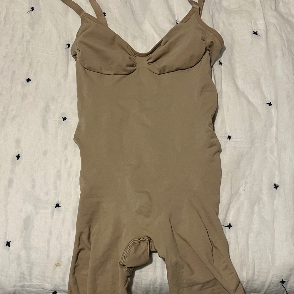 Skims mid thigh low back body shaping suit